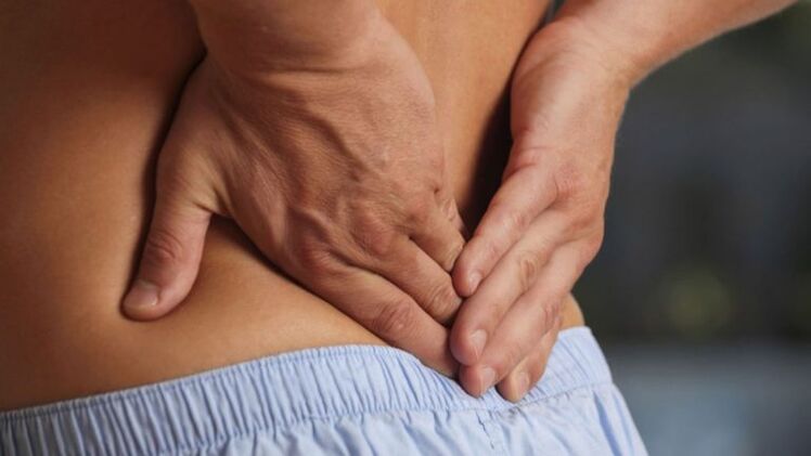 Ketidaknyamanan di punggung bawah dengan osteochondrosis lumbal